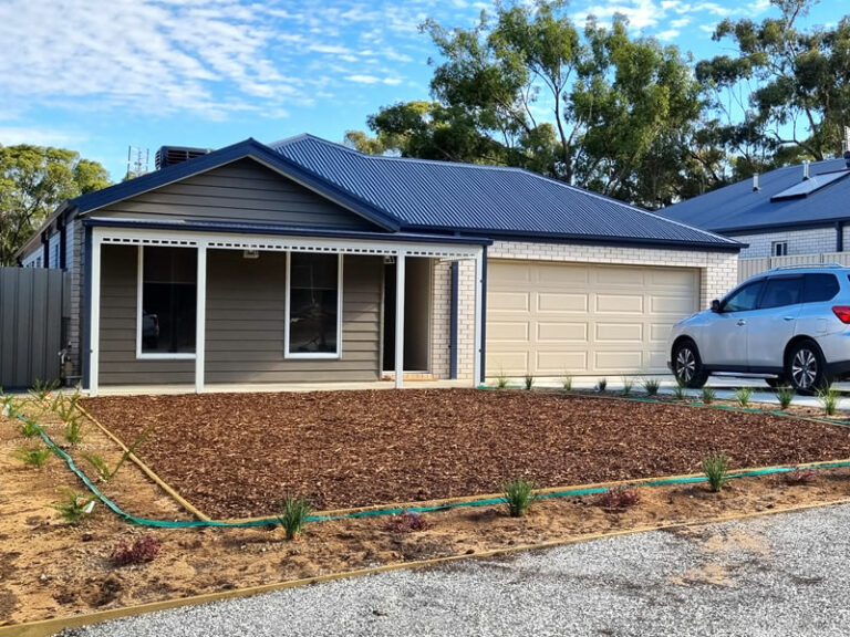 Landscaping example with garden mulch and garden beds